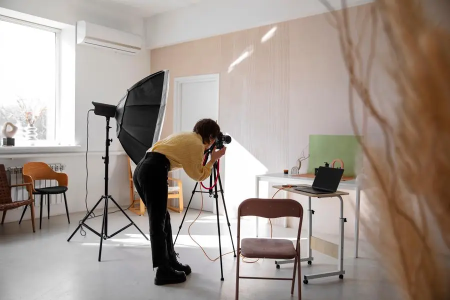 Female photographer running her studio business