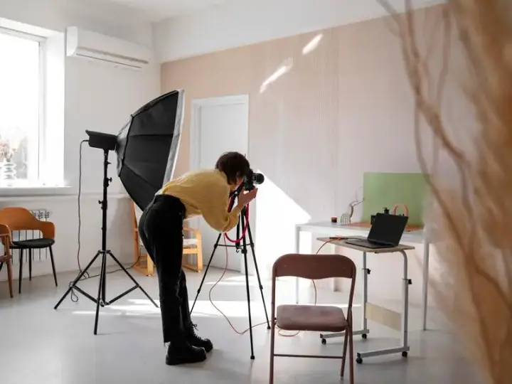 Female photographer running her studio business