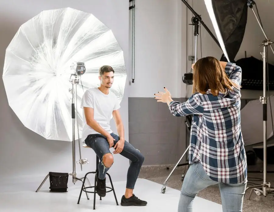 Photographer managing a client photo session